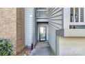Condo building exterior with entrance and brick accents at 5020 Sardis Rd # I, Charlotte, NC 28270