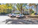 Parking lot view of condo building with some cars parked at 5020 Sardis Rd # I, Charlotte, NC 28270