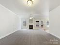 Bright and airy living room featuring a fireplace and ample space at 9153 Leah Meadow Ln, Charlotte, NC 28227