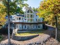 Lakefront home with expansive deck and beautiful natural setting at 115 Cloverhill Rd, Mooresville, NC 28117