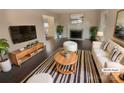 Living room features a fireplace and hardwood floors at 1601 Lyndale Pl, Charlotte, NC 28210