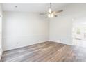 Bright living room with laminate floors and a ceiling fan at 210 Lauren Dr, Indian Trail, NC 28079