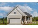 Beige and brown one-story house with a two-car garage and partial brick front at 5775 Crown Ter, Hickory, NC 28601