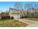 Two-story house with stone accents and basketball court at 7845 Kuck Rd, Mint Hill, NC 28227