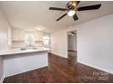 Open concept kitchen with white cabinets and an island at 2752 21St Ne St, Hickory, NC 28601