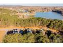 Aerial view of a house near a lake at 5241 Whitewater Dr, Hickory, NC 28601