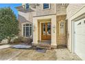 Elegant double front doors with sidelights, and a brick facade at 6926 Linkside Ct, Charlotte, NC 28277