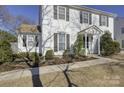 A close view of the home's front entrance, including the small landscaped yard at 1687 Riverdale Dr, Rock Hill, SC 29732