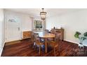 Bright dining room featuring hardwood floors and an oval wooden table at 2203 O'Hara Dr, Charlotte, NC 28273