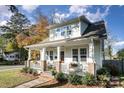 Quaint house with a covered porch and landscaping at 2358 Morton St, Charlotte, NC 28208