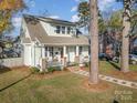 Suburban home with stone walkway and mature trees at 2358 Morton St, Charlotte, NC 28208