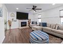 Spacious living room with L-shaped sectional sofa and fireplace at 505 Viking Sw Dr, Concord, NC 28025