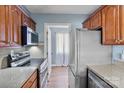 Kitchen with stainless steel appliances and wood cabinets at 5190 Corbin Ln, Hickory, NC 28601