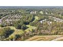 Aerial view of homes and golf course at 1182 Lost Cove Rd, Indian Land, SC 29707