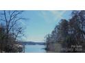 Beautiful lake view highlighting the serene and natural surroundings at 198 Clouse Ln, Taylorsville, NC 28681