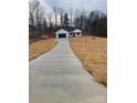 Long driveway leading to a newly constructed home at 2045 Cordia Cir, Newton, NC 28658