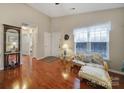 Inviting living room featuring hardwood floors and a comfortable seating area at 2935 Dairy Farm Dr, Monroe, NC 28110