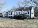 Ranch style home with a front yard and driveway at 350 Turnersburg Hwy, Statesville, NC 28625