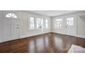 Bright living room with hardwood floors and fireplace at 400 E 27Th St, Kannapolis, NC 28083