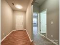 Light and bright entryway with wood floors at 5052 Haven Lodge Rd, Matthews, NC 28104