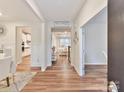 Inviting home foyer featuring gleaming hardwood floors and a view into the bright living spaces at 5057 Spratt Rd, York, SC 29745