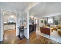 Bright and spacious entryway with hardwood floors, leading to living room and kitchen at 6737 Lancer Dr, Charlotte, NC 28226