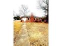 Brick ranch house with a sidewalk leading to the front entrance at 901 Maple Ave, Salisbury, NC 28144