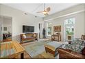 Spacious living room with hardwood floors and access to a balcony at 1315 East Blvd # 203, Charlotte, NC 28203