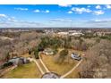 Aerial view showcasing two houses, spacious yards, and a cul-de-sac at 160 Pampas Ln, Mooresville, NC 28117