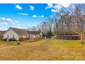 Large backyard with a above ground pool at 160 Pampas Ln, Mooresville, NC 28117