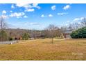 Spacious backyard with a above ground pool and deck at 160 Pampas Ln, Mooresville, NC 28117