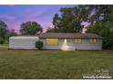 White brick ranch house with a metal shed and well-maintained yard at 2697 Knotty Pine Dr, Lancaster, SC 29720