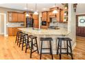 Spacious kitchen with granite countertops, custom cabinetry, and stainless steel appliances at 3196 Stonemill Path, Sherrills Ford, NC 28673