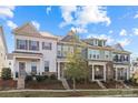 Townhome community featuring three similar two-story townhouses at 4020 Harmony Hills Dr, Matthews, NC 28104