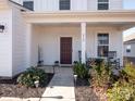 Charming front porch with rocking chairs and tasteful decor at 450 Caleb St, Monroe, NC 28110