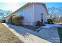 Side view of the house showcasing the landscaping at 6615 Love Mill Rd, Monroe, NC 28110