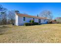 Back view of the house with a large backyard at 6615 Love Mill Rd, Monroe, NC 28110