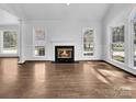 Bright living room featuring hardwood floors and fireplace at 918 Clover Park Dr, Clover, SC 29710