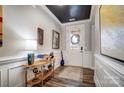 Bright entryway with dark wood floors and decorative accents at 9428 Liberty Hill Dr, Mint Hill, NC 28227