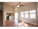 Bright dining area with hardwood floors and view to kitchen at 9445 Meadowmont View Dr # 137, Charlotte, NC 28269