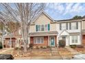 Attractive townhome exterior with neat landscaping and brick accents at 2944 Caldwell Ridge Pkwy, Charlotte, NC 28213