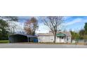 Single story house with carport and fenced yard at 3706 2Nd Nw Ave, Hickory, NC 28601