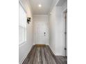 Bright entryway with gray wood-look flooring and neutral walls at 345 Hyssop Ct, Fort Mill, SC 29715