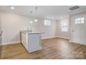 Modern kitchen with white cabinets and granite countertops at 1455 Southwest Blvd, Newton, NC 28658