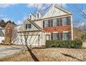 Two-story home with brick and siding exterior, two car garage at 15011 Edindale Dr, Charlotte, NC 28277