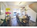 Bright dining room with hardwood floors, a large table, and access to a patio at 1866 Baylor Dr, Rock Hill, SC 29732