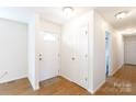 Bright entryway with wood floors and coat closet at 3988 Crestview Dr, Rock Hill, SC 29732