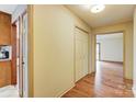 Bright hallway with hardwood floors and double doors at 4452 Huntington Dr, Gastonia, NC 28056