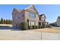 Brick home with two-car garage and manicured landscaping at 5600 Ballenger Ct, Waxhaw, NC 28173