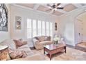 Spacious living room with coffered ceiling and large windows at 5600 Ballenger Ct, Waxhaw, NC 28173